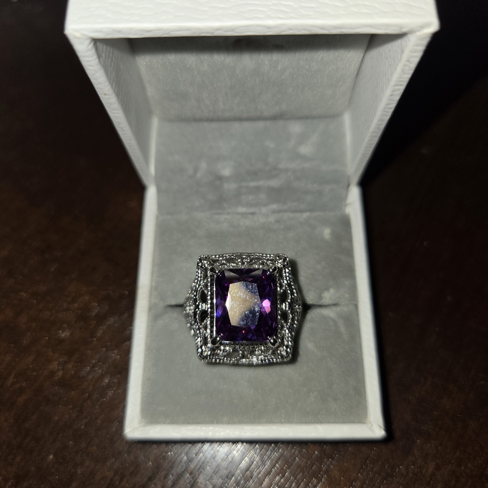 Elegant Silver and Purple Gemstone Ring